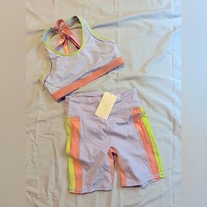 Fabletics sports bra and short set. Bottoms NWT Size M. Top size  Large
